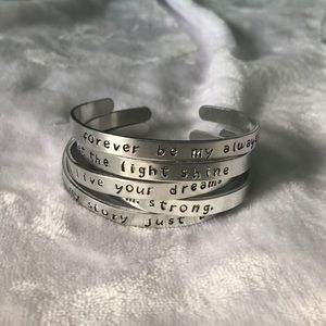 Mystery stamped aluminum bracelet!